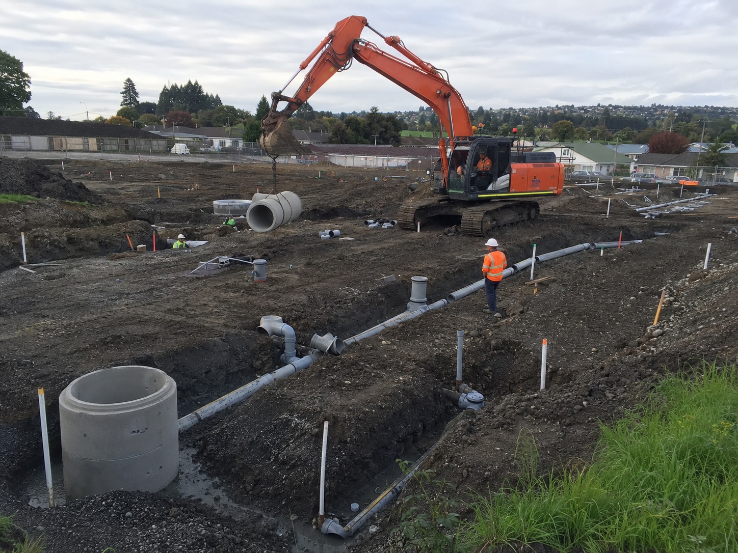 Large-scale subdivision excavation and stormwater pipe installation in Hamilton
